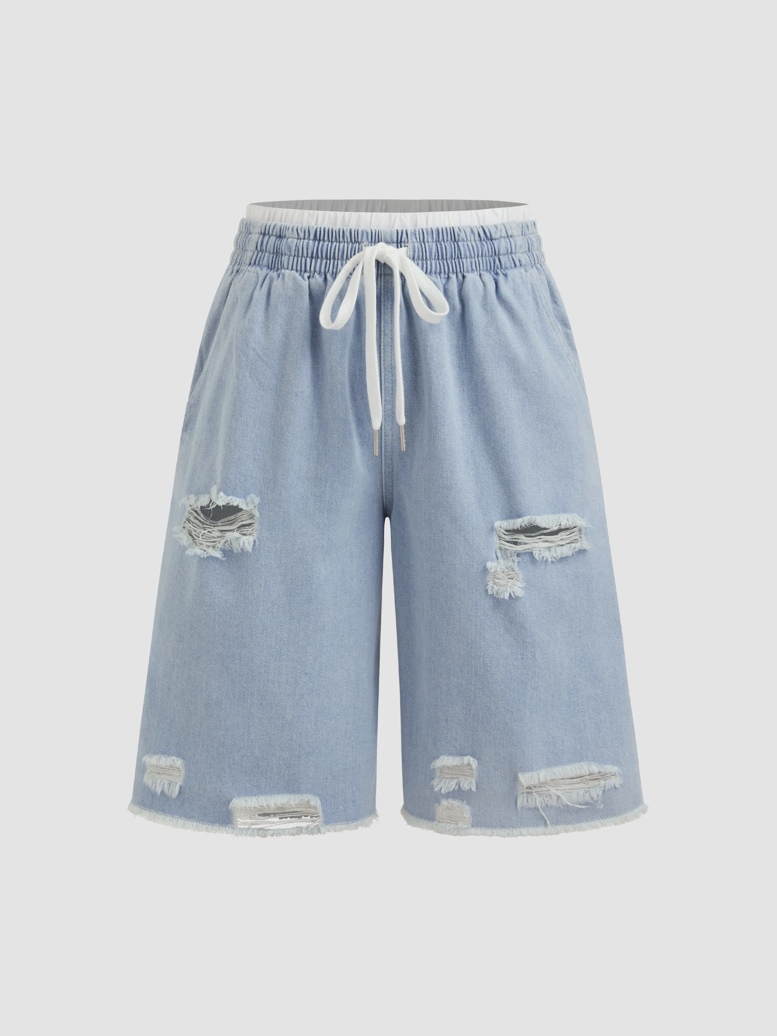 Bermudas vaqueras de tiro alto con detalle de ribete en contraste y rotos