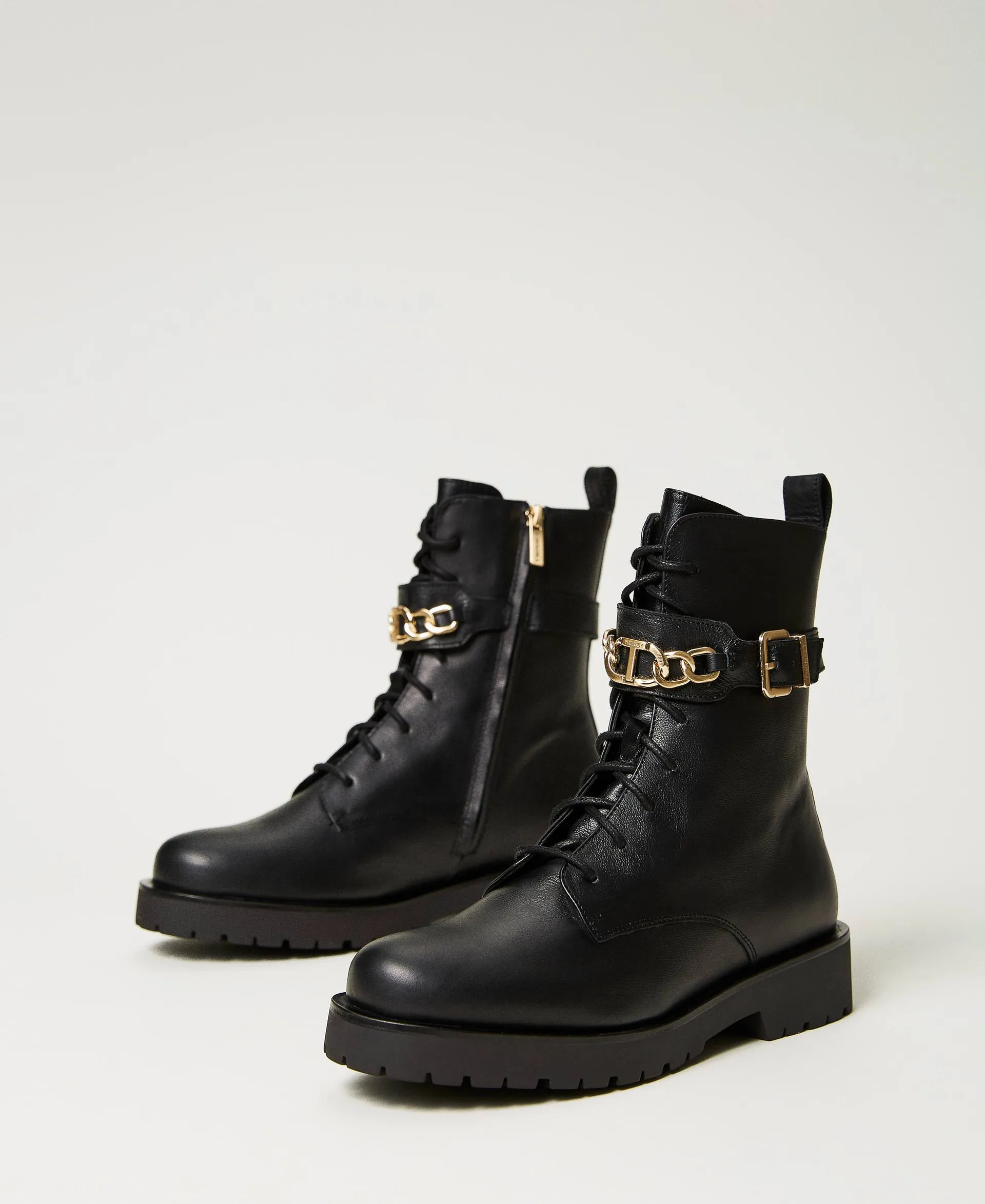 Bottines motardes en cuir avec chaîne Oval T