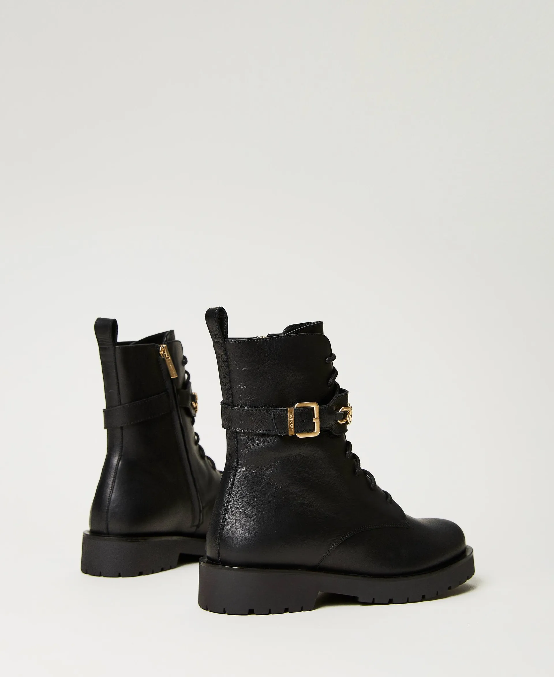 Bottines motardes en cuir avec chaîne Oval T