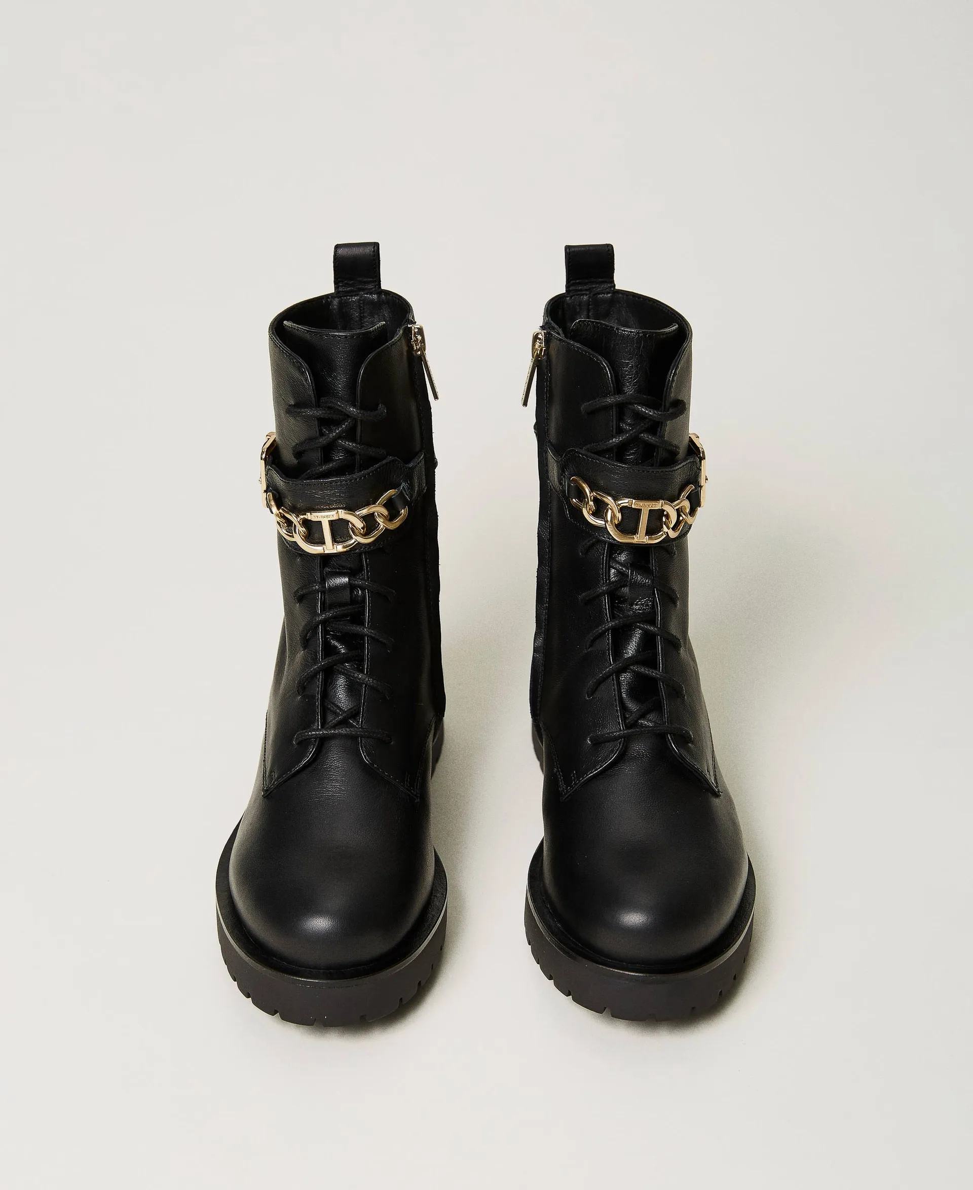 Bottines motardes en cuir avec chaîne Oval T