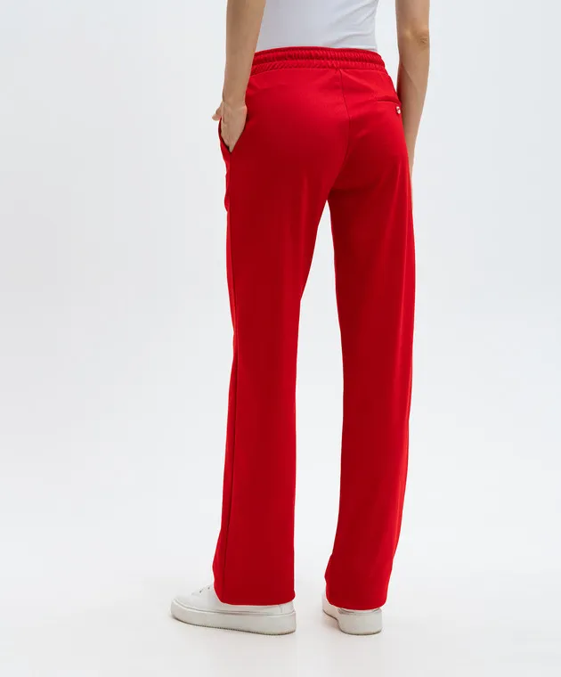 Coperni Red sweatpants with logo emblem