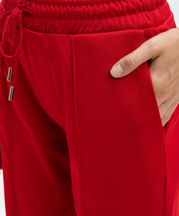 Coperni Red sweatpants with logo emblem
