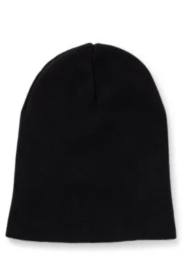 Gorro de punto de algodón con etiqueta con logo azul
