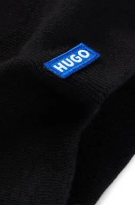 Gorro de punto de algodón con etiqueta con logo azul