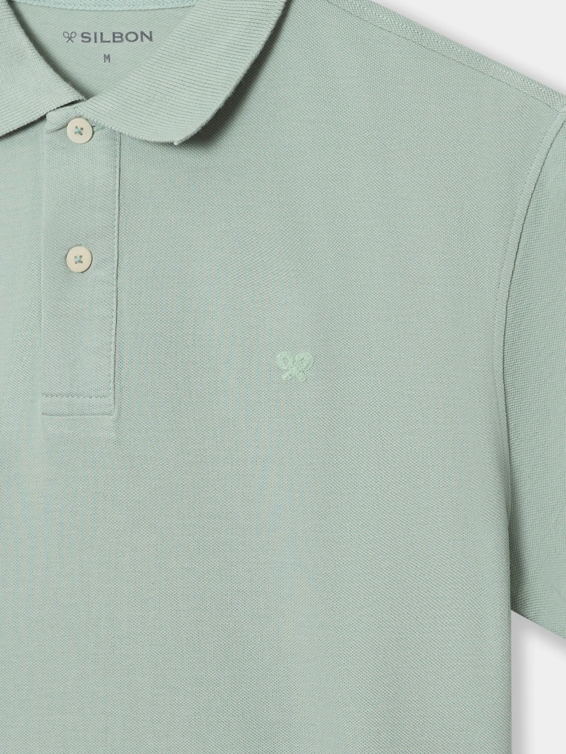 Polo liso logo medio verde