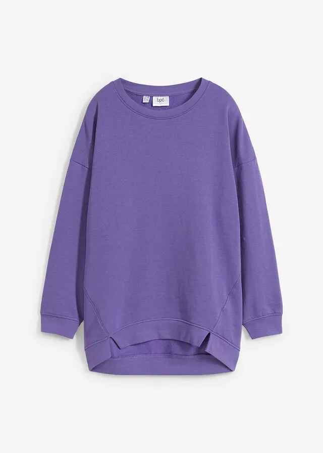 Sudadera holgada con detalle de abertura púrpura
