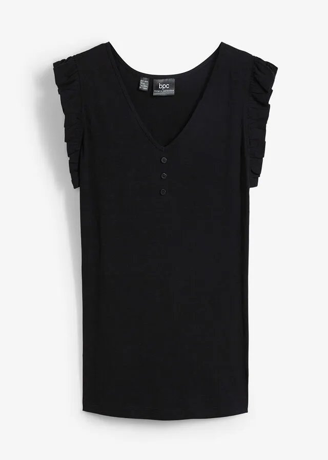 Top de hilo flameado de algodón con detalle de volante Negro